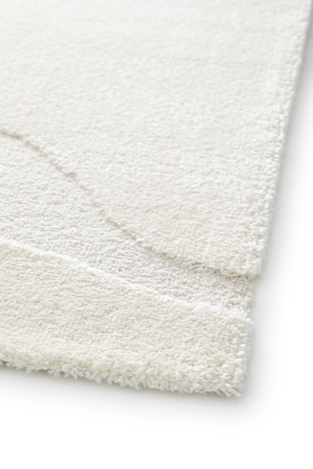Tapis doux à motifs en relief OSMOSE