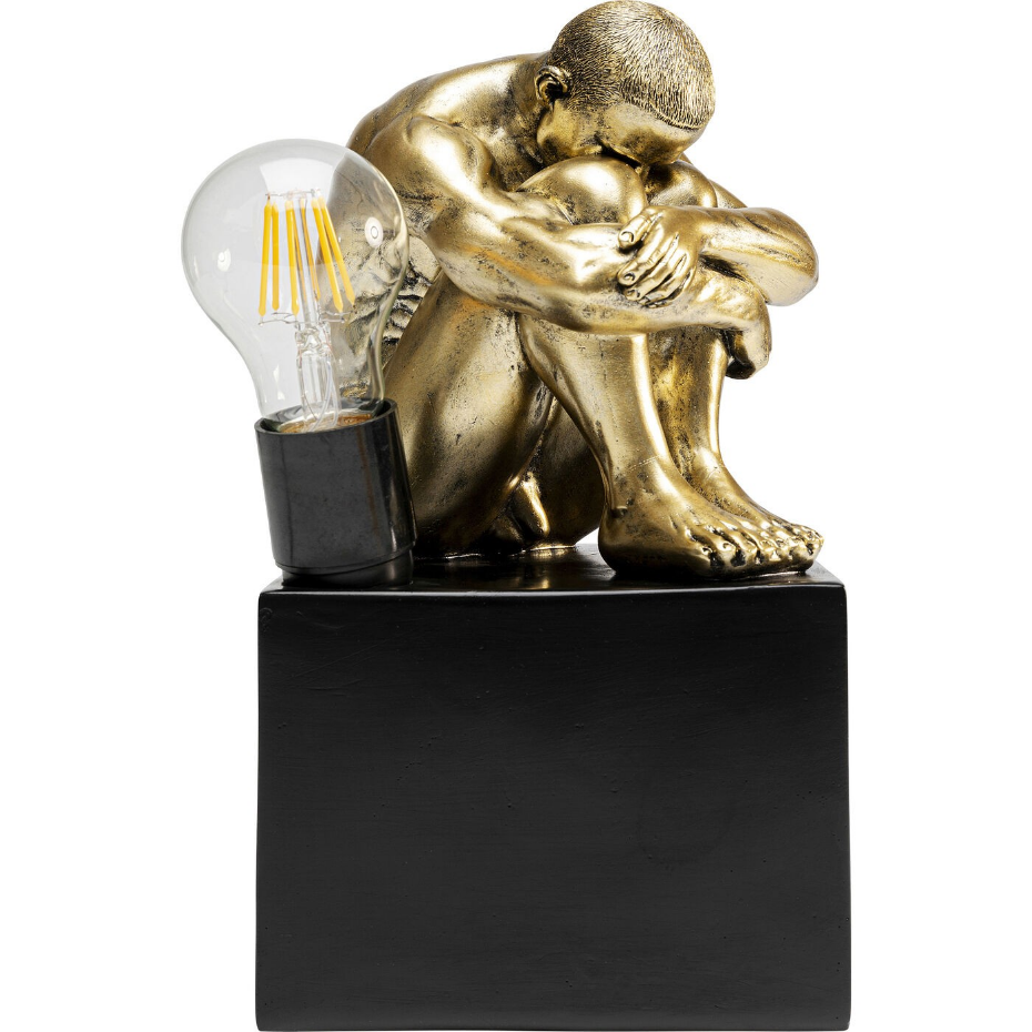 Lampe homme recroquevillé