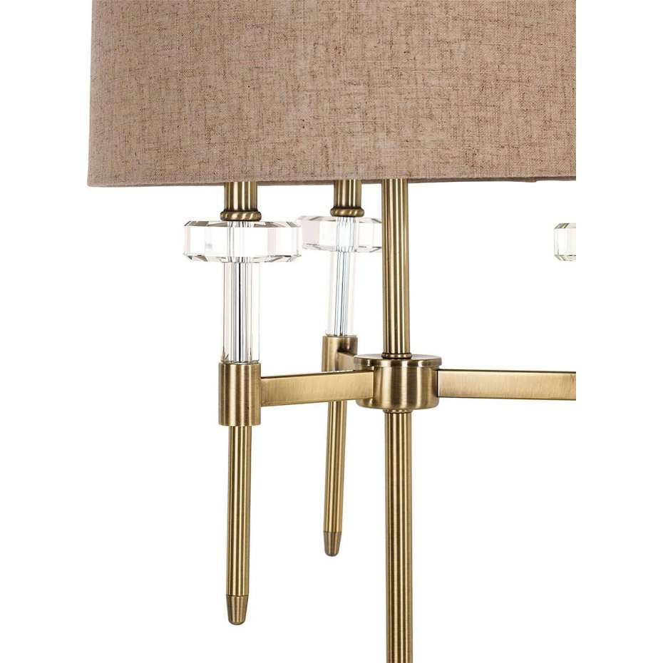 Lampe de table ronde en laiton brossé et cristal