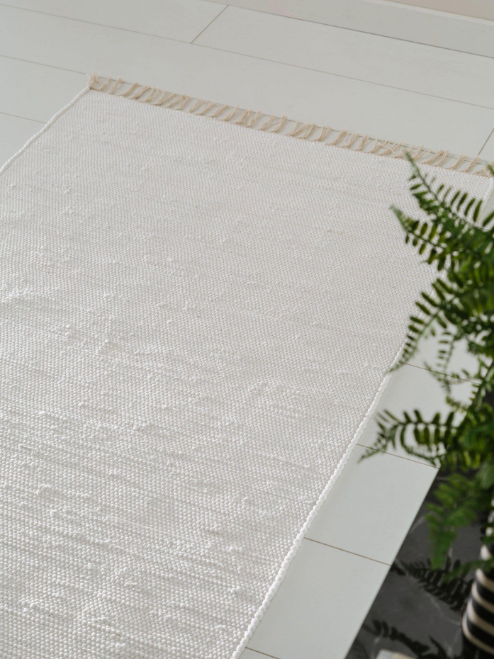 Tapis fabriqué à partir de matériaux recyclés tissé main TOM