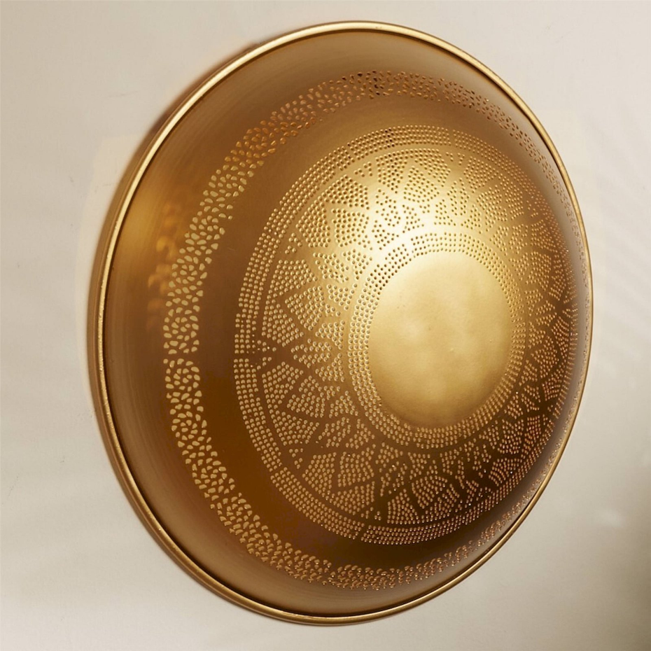 Applique murale ronde en métal effet ajouré