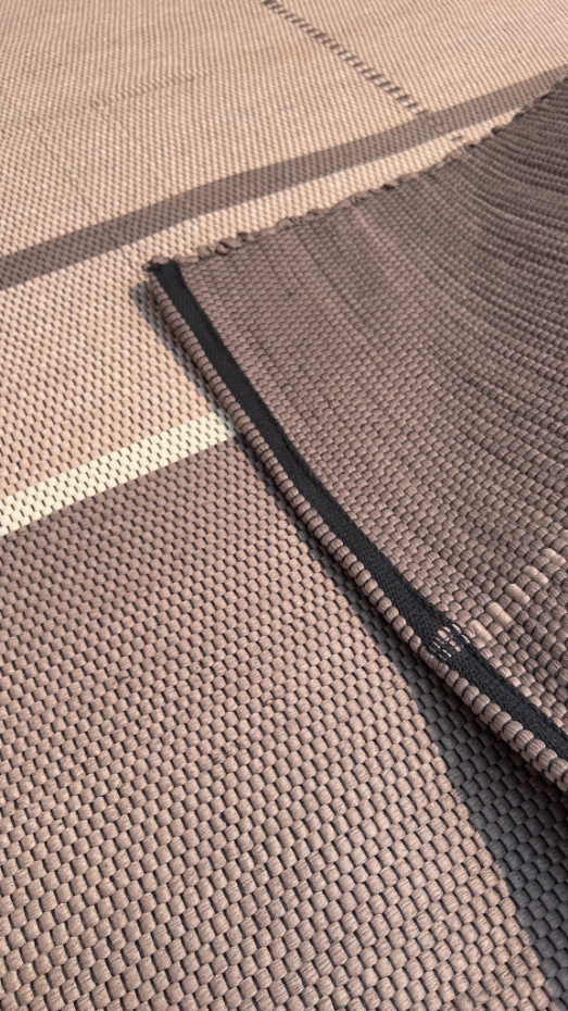 Tapis en fibres recyclées tissé à la main LEONOR