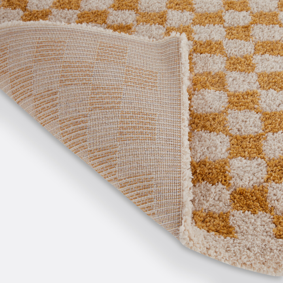 Tapis damier, Eras
