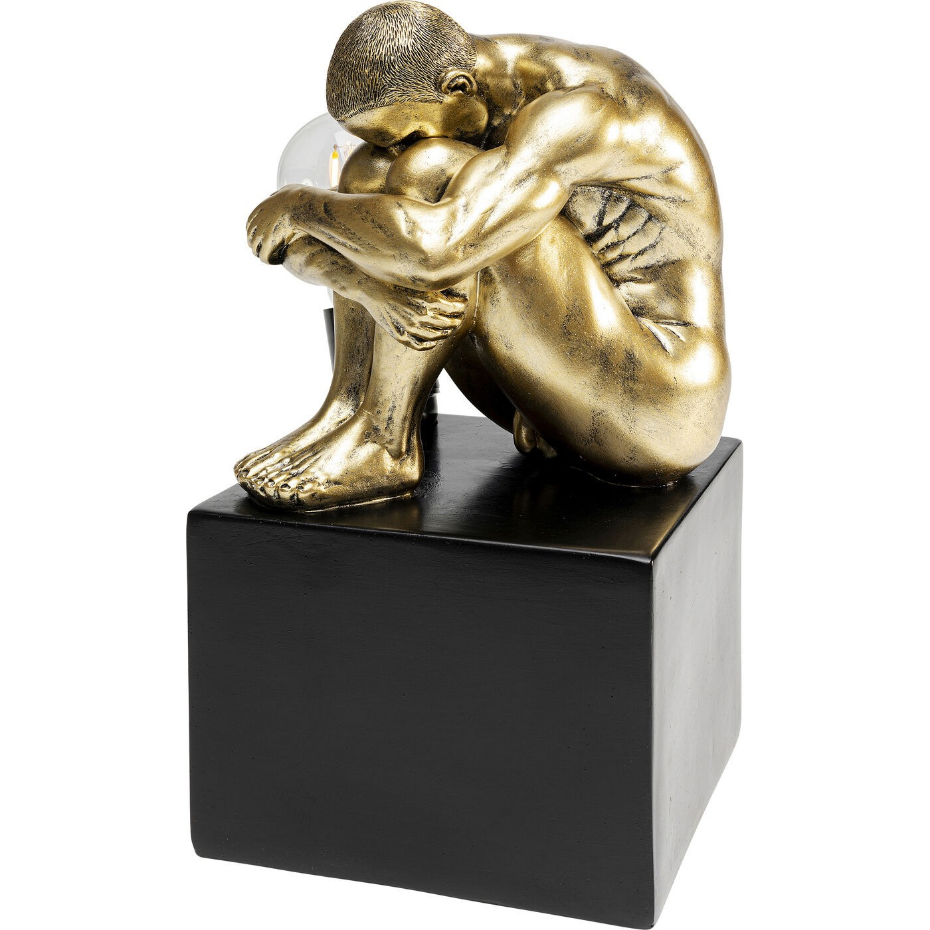 Lampe homme recroquevillé