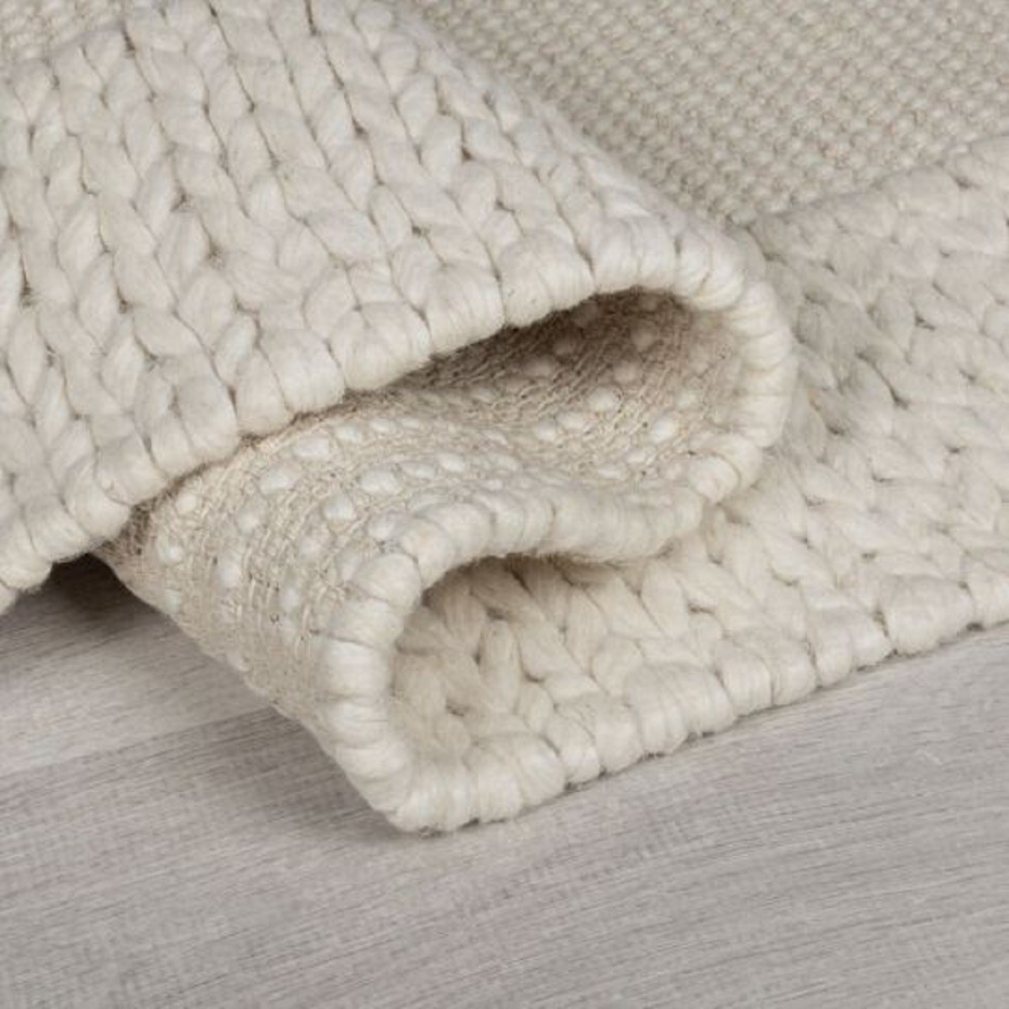 Tapis salon et chambre design tressé en laine PILAT