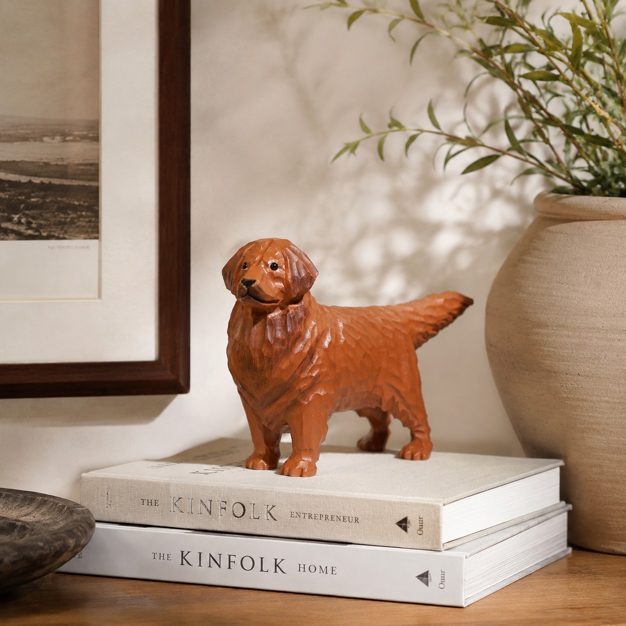 Warm brown dog ornament styled on books