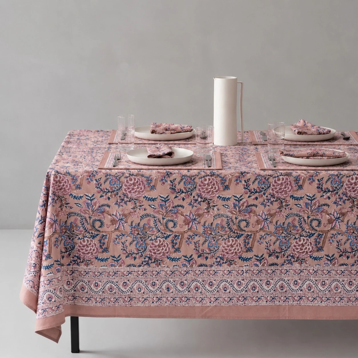 Rose mauve floral tablecloth on a dining table