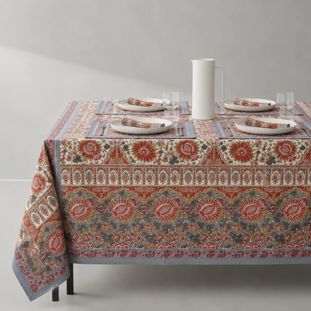 Charcoal paisley floral tablecloth on a dining table