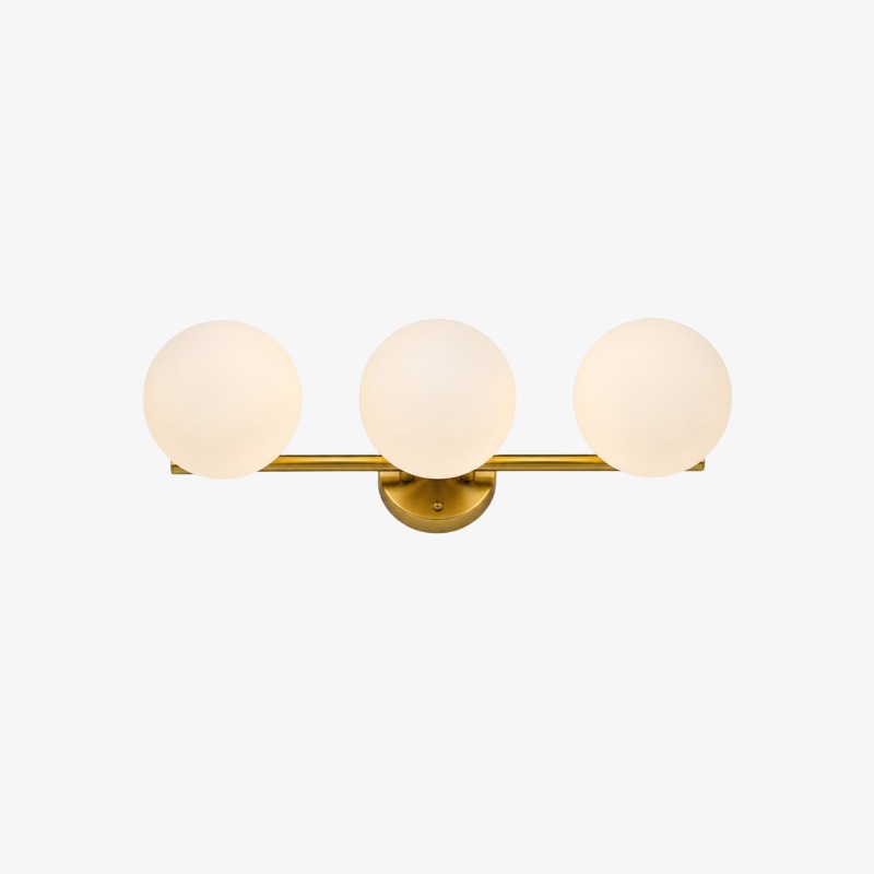 Guldfärgad sminklampa med tre ljuskällor och glober i mjölkglas