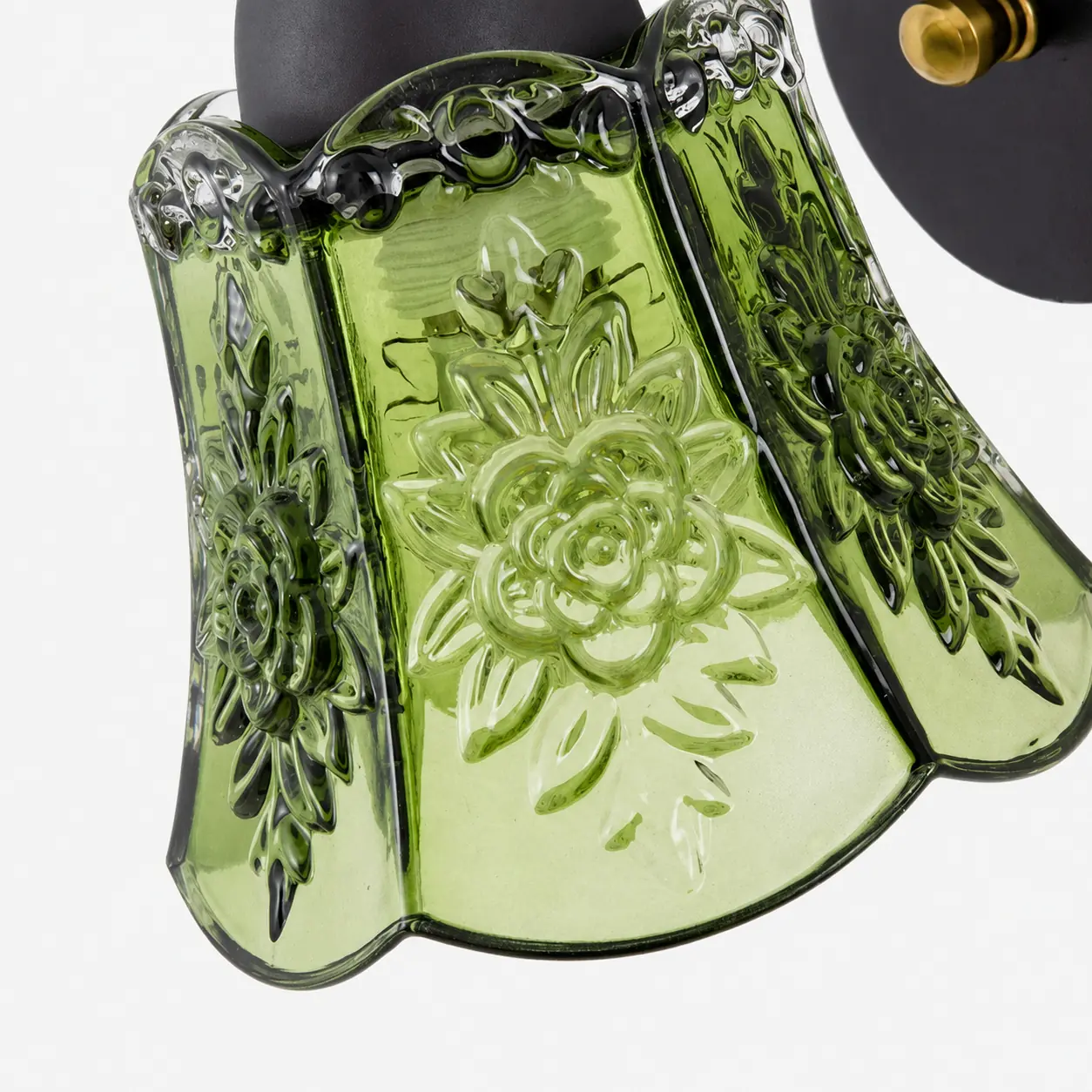 Pressad grön blommig glasskärmdetalj